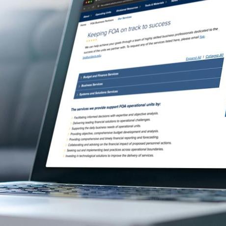 decorative image of laptop displaying FOA business partners webpage